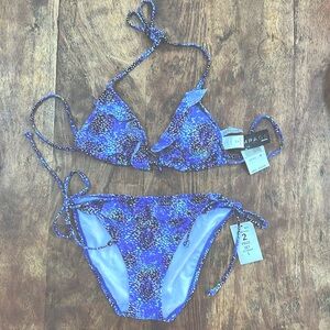 NWT Rampage multi color string bikini with ruffle detail. Top is M, bottom is L